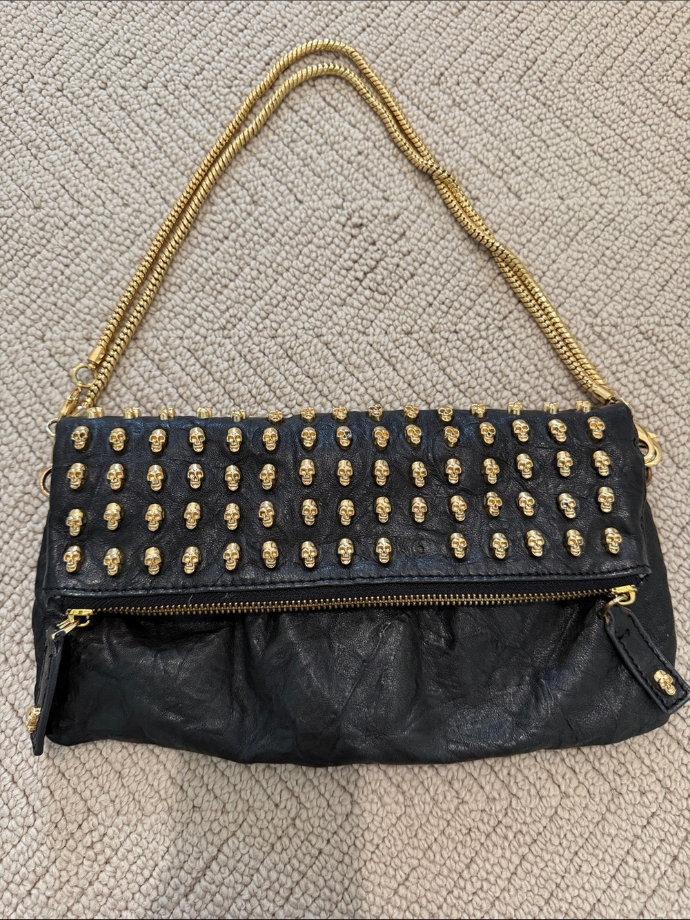 Black Leather Shoulder Bag with Gold Skull Studs